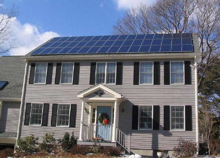 Solar_panels_on_house_roof_winter_view