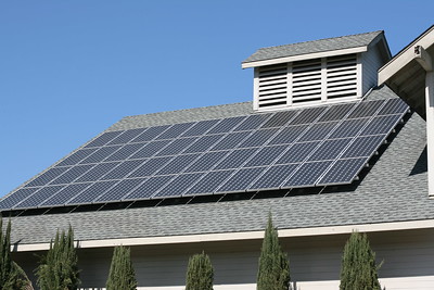 Solar panels on a sloped roof.