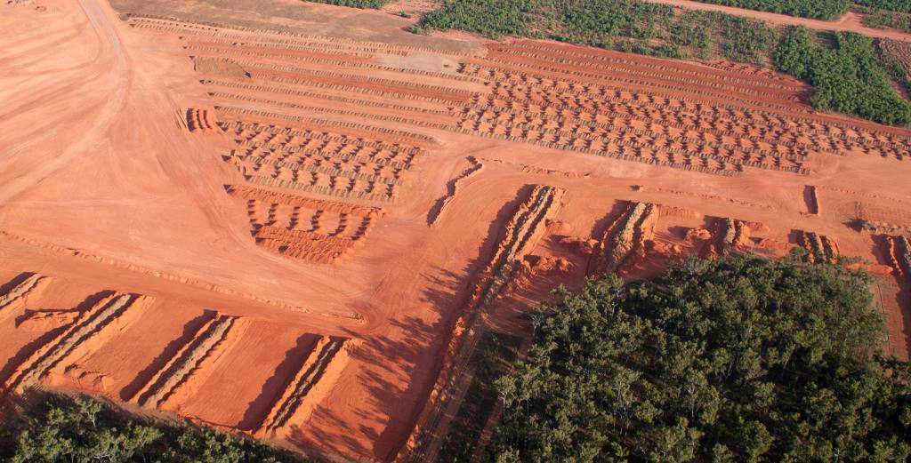 An image of a bauxite ore mine and the destruction caused to the local landscape.